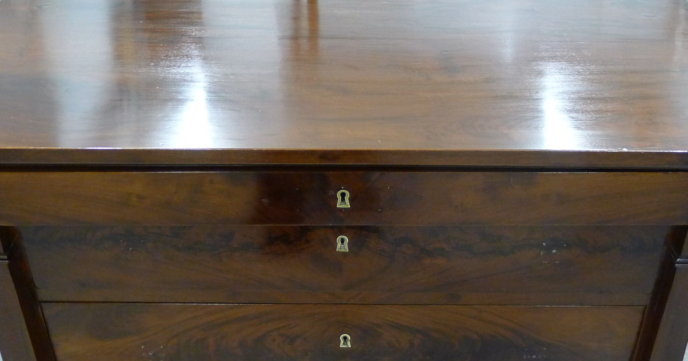 A detailed view of a wooden desk