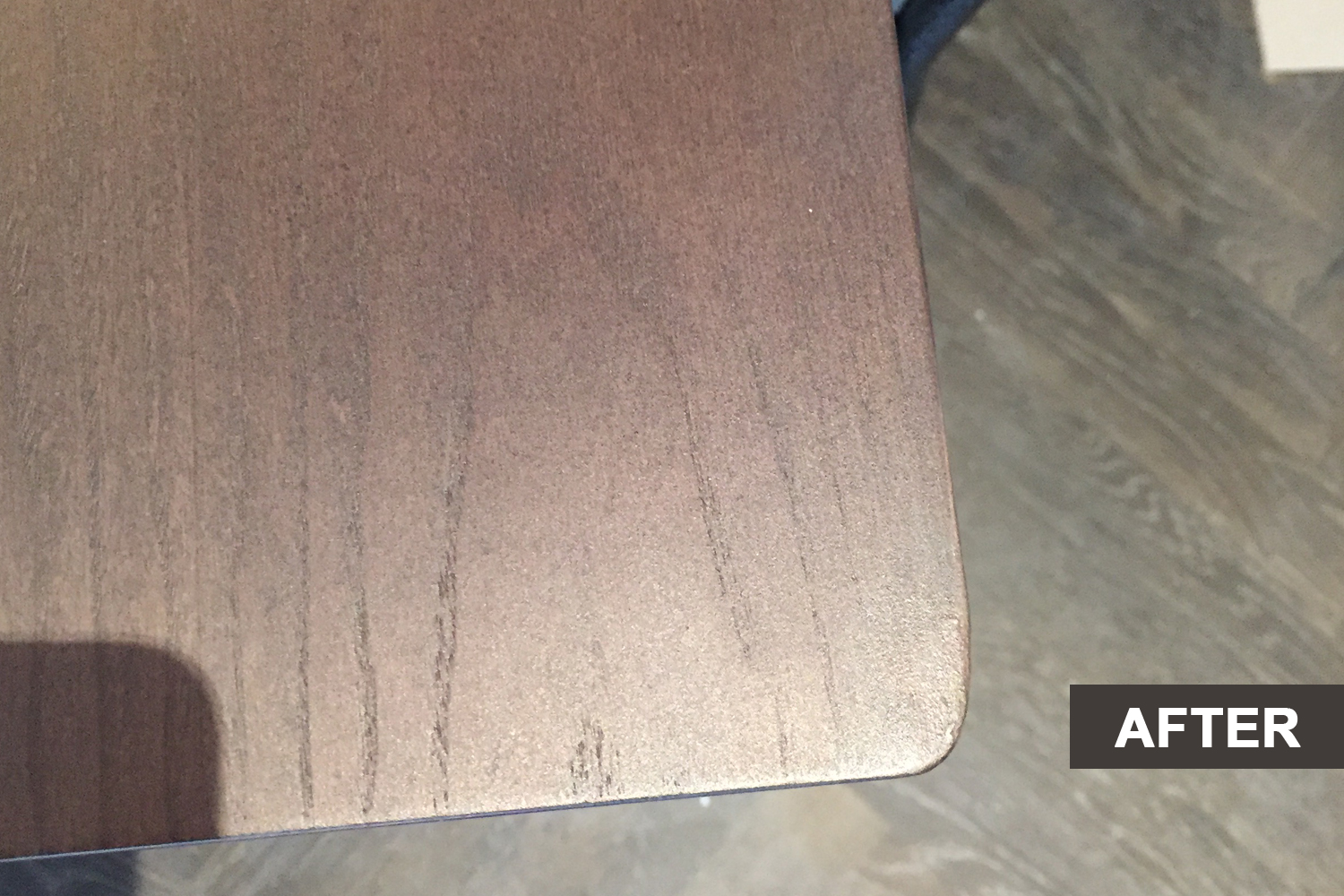 A wooden table with a small crack after restoration